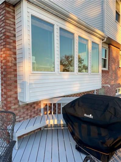 View of the Sunroom windows from the deck