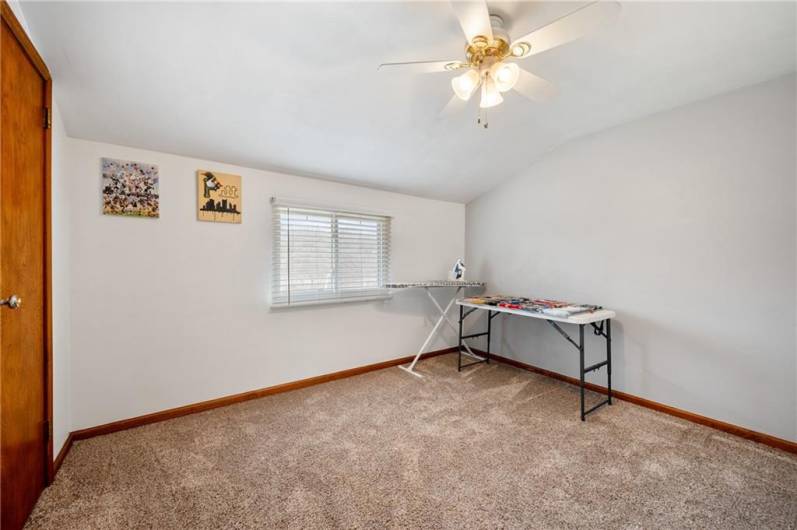 The third bedroom is the perfect spot for a nursery or reading room.