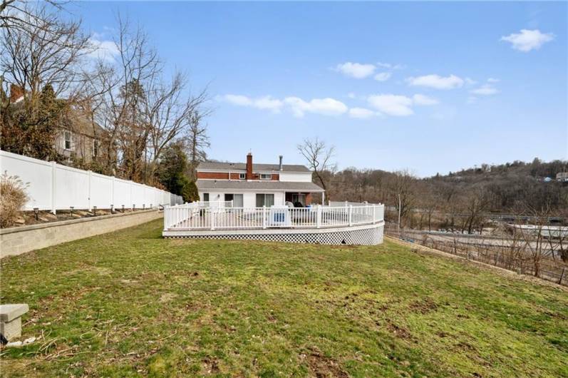 The back yard has plenty of space for gardening or yard games for the kids or adults.