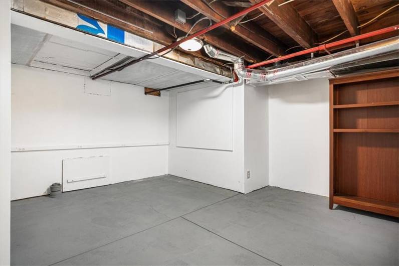 Large basement with high ceilings - can be finished or used for workout space!