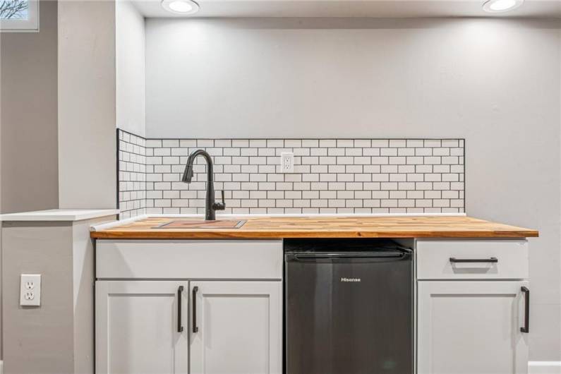 Custom Wet Bar with Butcher Block and a Mini Fridge