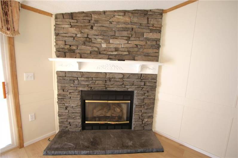 Stunning Stone Gas Fireplace w/ Wood Mantel