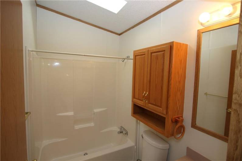 Main Full Bathroom w/ Skylight & Medicine Cabinet