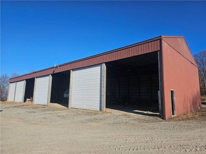 #4 BUILDING 6720 SQ FT METAL ROOF  4 ELECTRIC GARAGE DOORS