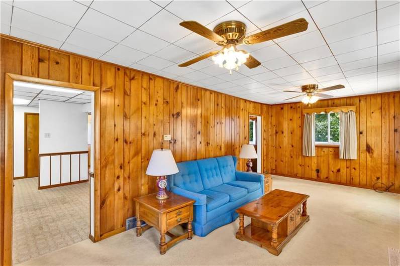 Living room, showing access to kitchen/dining room