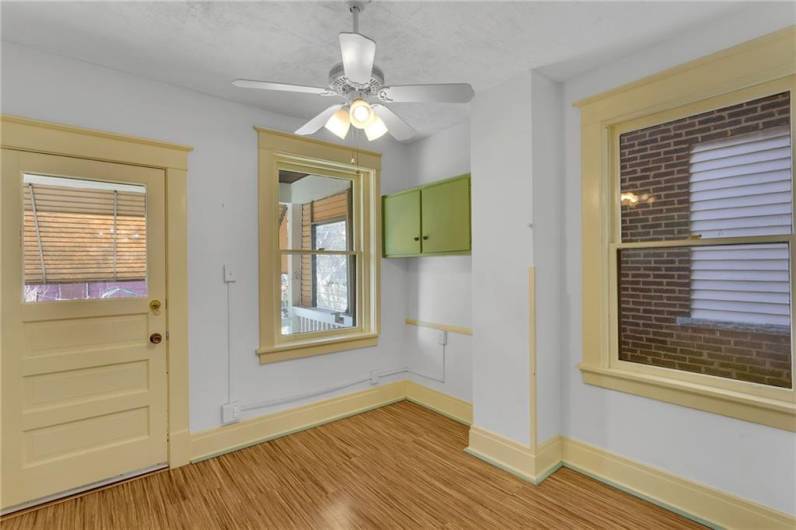 Kitchen area with access to back porch