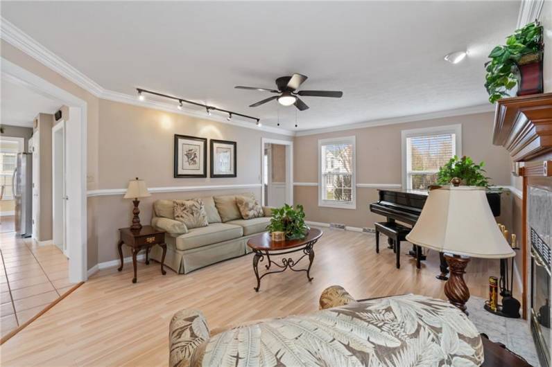 Ideally located adjacent to the eat-in kitchen, this dynamic floor plan offers ample space for entertaining.