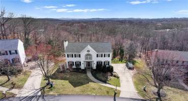 Picturesque views and gorgeous sunsets are offered in this exceptional custom-built home located on a .41 acre lot in desirable Autumn Hill.  Nestled on a quiet cul-de-sac street, you will love the proximity to all Cranberry has to offer.