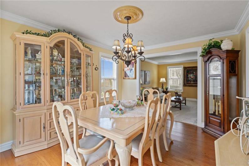 New crown molding and millwork about the windows and doorways showcase the beautiful views.