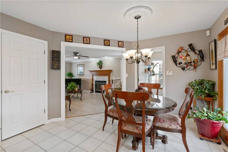 Ideally located off of the eat-in kitchen is the main level laundry room.