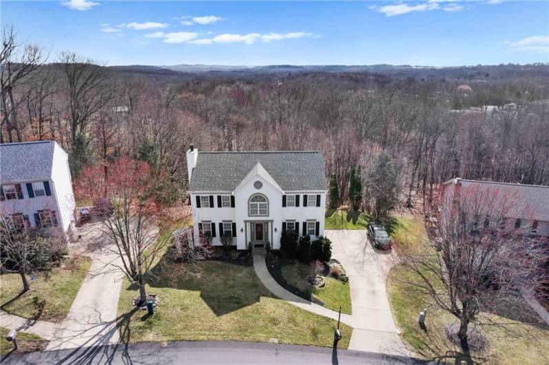 Picturesque views and gorgeous sunsets are offered in this exceptional custom-built home located on a .41 acre lot in desirable Autumn Hill.  Nestled on a quiet cul-de-sac street, you will love the proximity to all Cranberry has to offer.