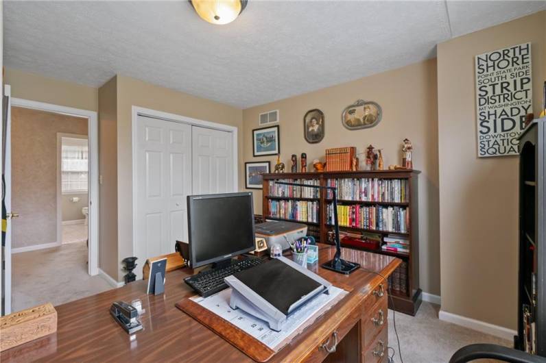 Plush neutral carpet and a double closet are sure to delight.