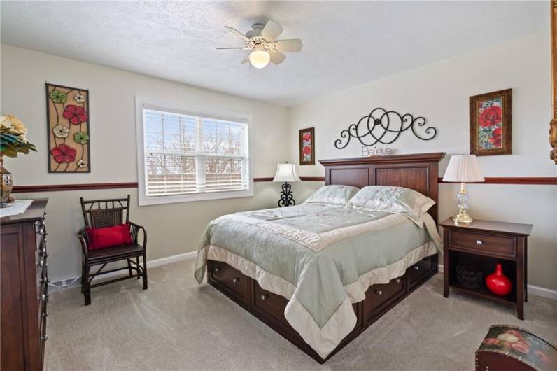 This bedroom boasts double windows that afford gorgeous views of the serene back yard and woods.  You will appreciate the plush neutral carpet, and generous closet size.