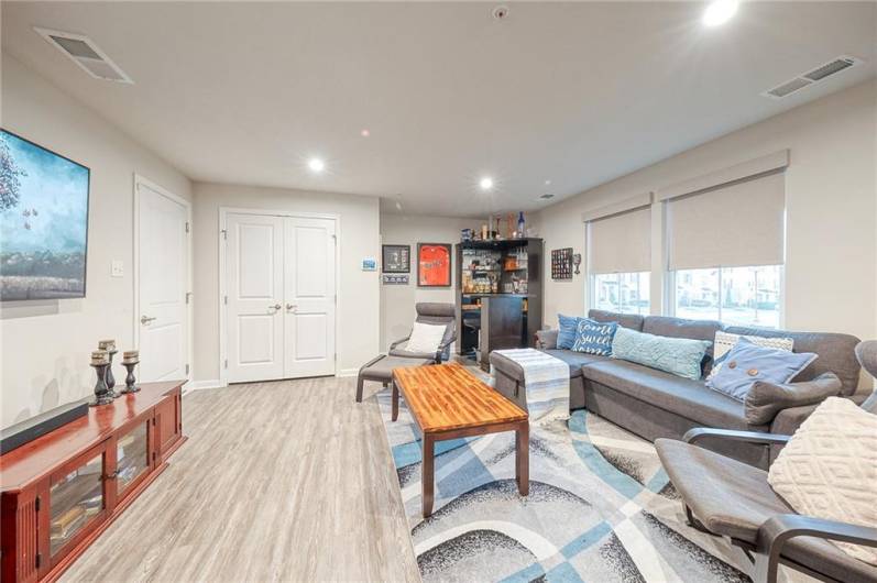 another view of the finished lower level -Game room or Family room.