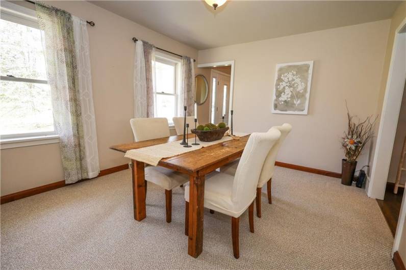 The formal dining room is situated to the right of the foyer and sits right off the kitchen