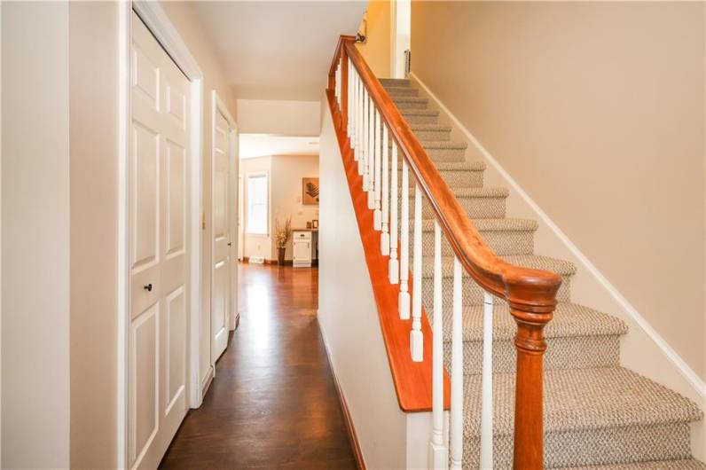 Beautiful foyer with double closets and a walkway to the kitchen/FR combo