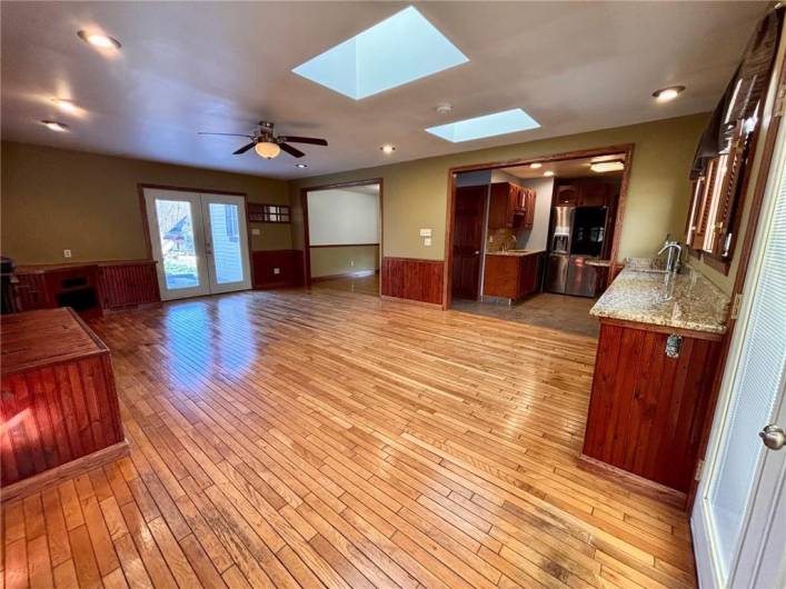 Family room with wet bar and kegerator.