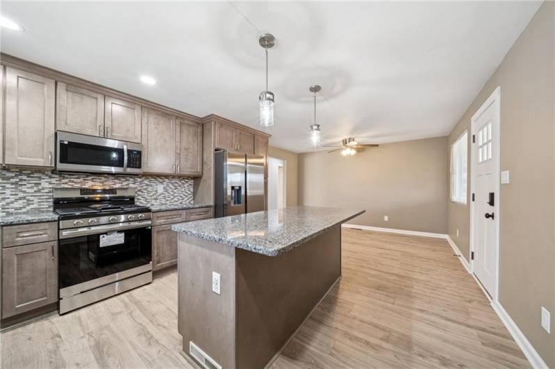 SOFT CLOSE CABINETS/NEW FLOORS/LIGHT FIXTURES/ETC.