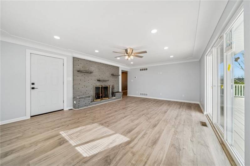 COVE CEILING DESIGN.  RECESSED LIGHTS.  NEW LIGHT/FAN FIXTURE.  FIREPLACE.