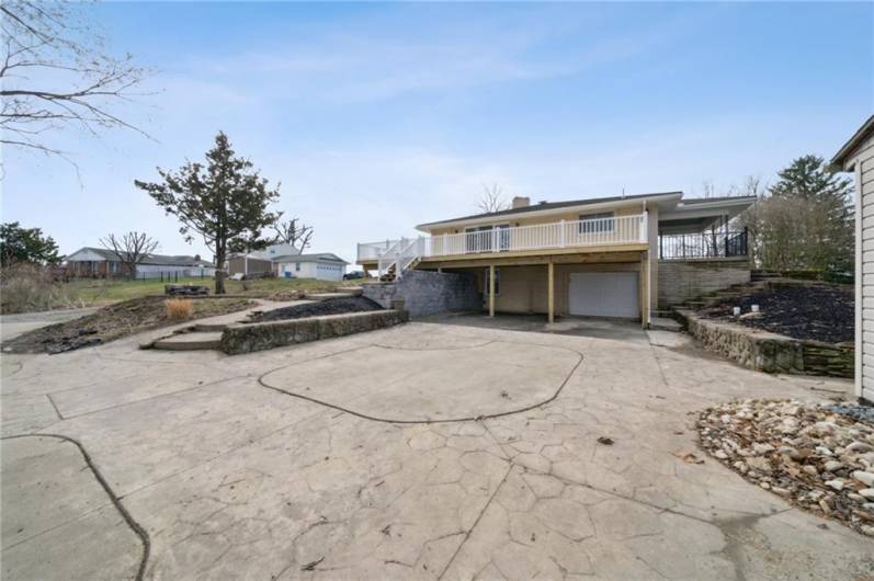 STAMPED CONCRETE DRIVEWAY IS HUGE.  INT/GRG SHOWN IN THIS VIEW.