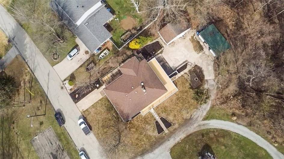 YARD GOES BEYOND DETACHED GARAGE.