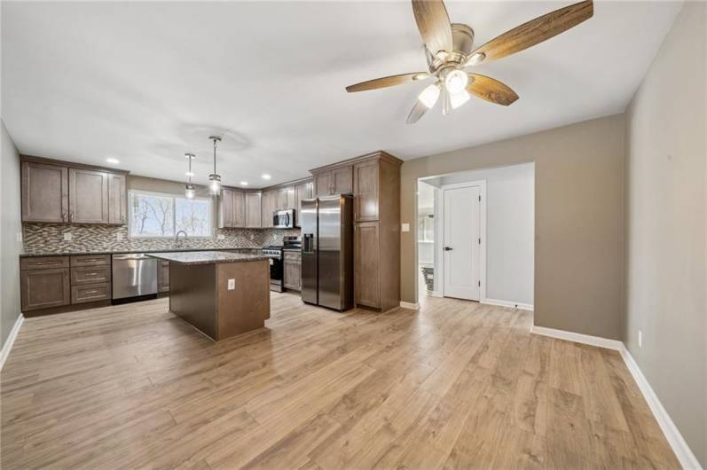 COMBINED KITCHEN/DINING ROOM.  NEW KITCHEN CABINETS, GRANITE COUNTERTOPS, AND LARGE KITCHEN ISLAND