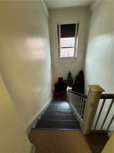 3rd floor rear staircase to E Beau St entrance.