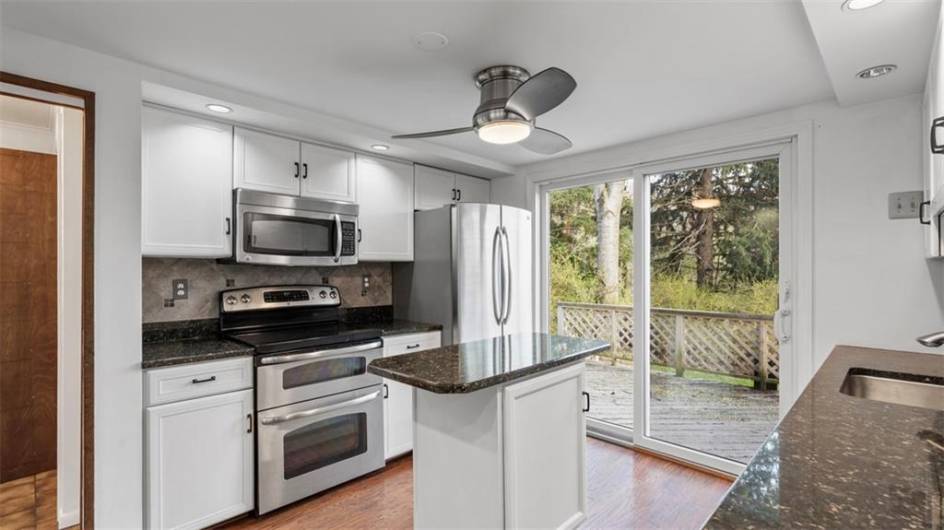 Granite Countertops, Stainless Steel Appliances and Tile backsplash make for easy clean up!