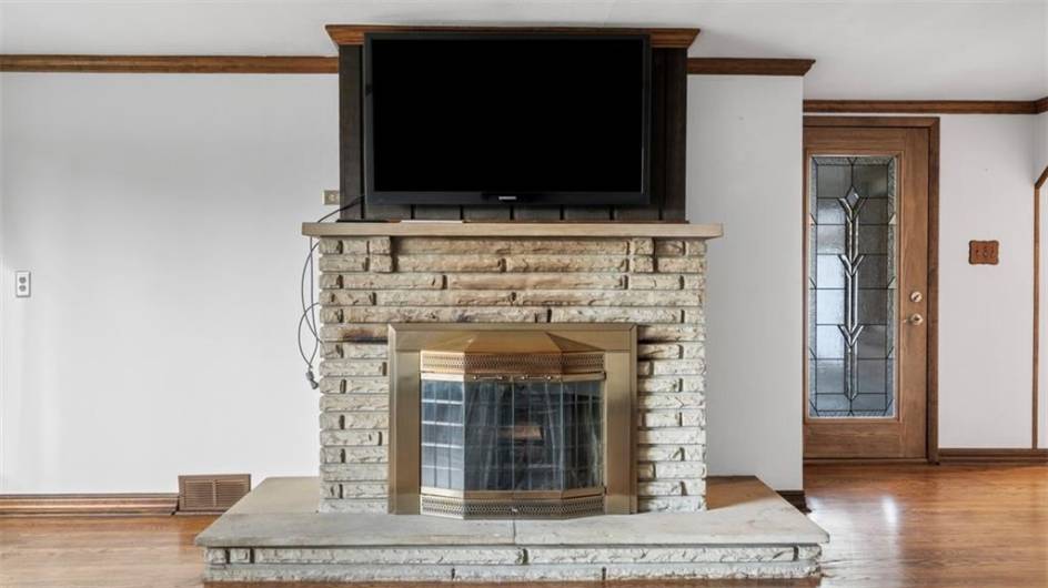 Cozy winter night with a real wood burning fireplace