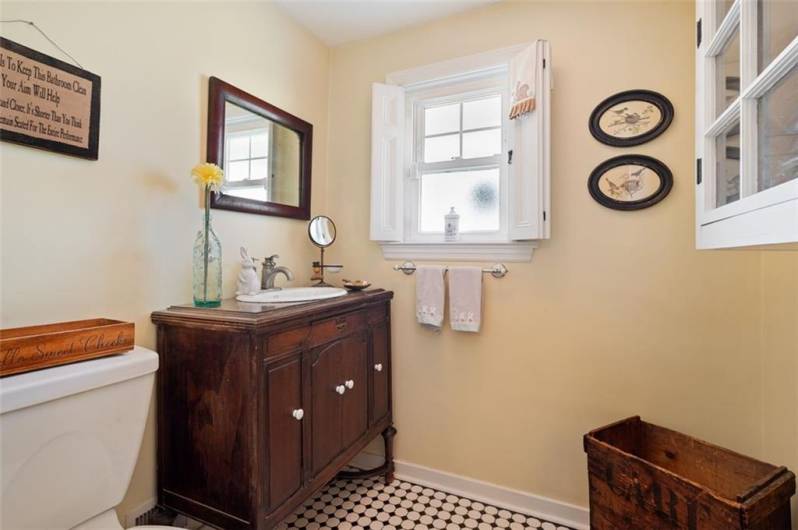 First floor powder room with easy access to all first-floor rooms.