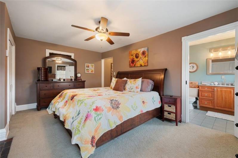 Another angle of the primary bedroom and easy access to the primary bathroom.