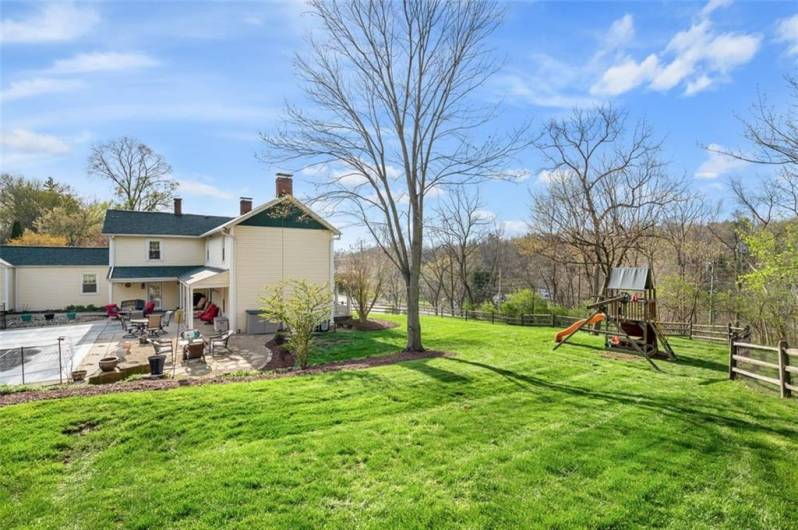 WOW! Are you looking for outdoor space!  Look no further! This is it. To find over 1.5 acres in the suburbs and it is flat!  You can also see the lovely back patio and in-ground pool area, too!