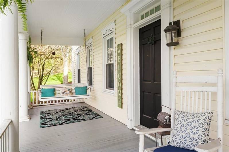 Welcoming front porch with your own porch swing...sit, relax and enjoy the outdoors!