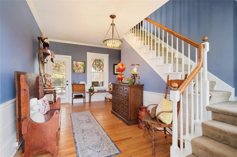 Classic charm, another view of the front door and easy access to the second floor.