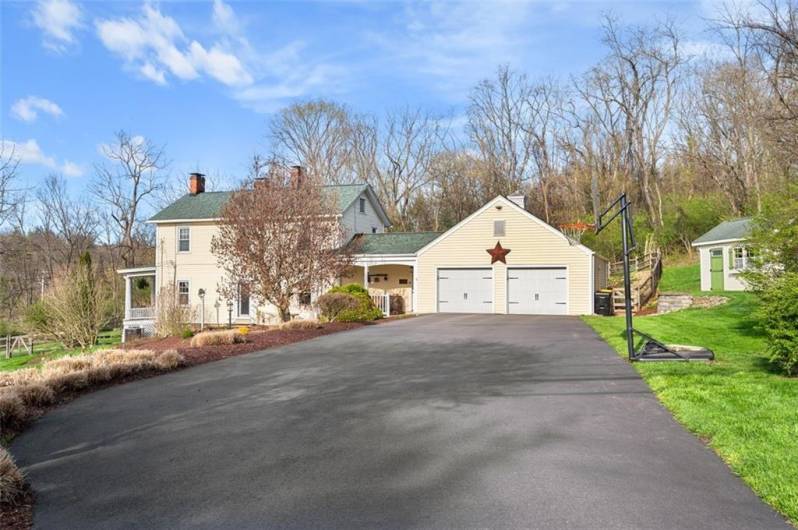 Looking for space...Come and see the oversized 2 plus attached garage and outdoor storage shed.  Do you like to entertain? This is your home, your guests have ample parking in this extended driveway.