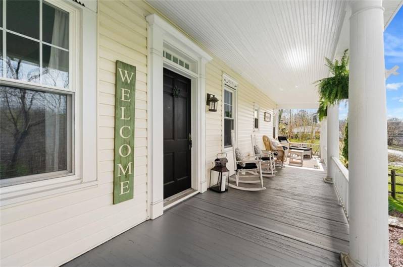 WELCOME to the inviting classic farmhouse charm of the stately front porch.  ENJOY!