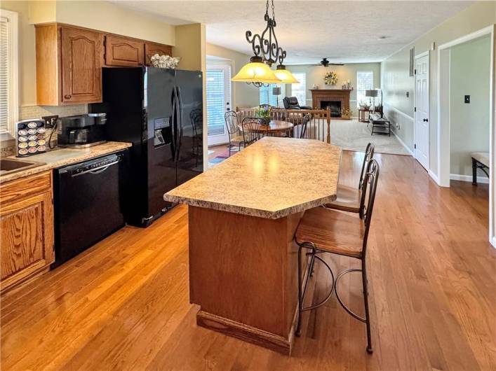 Open kitchen and dining room are perfect for entertaining.