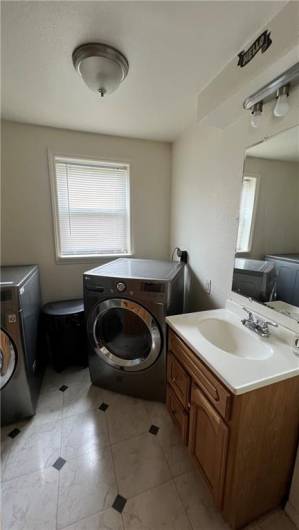 Convenient first floor laundry with half bath.