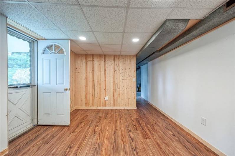 Game room leads to the patio and back yard.
