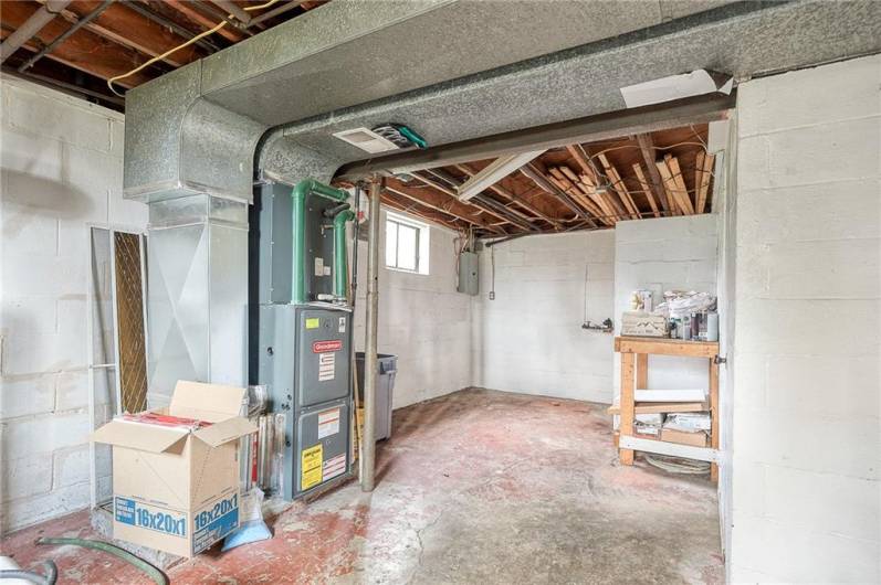 Full basement for laundry and storage with integral garage.