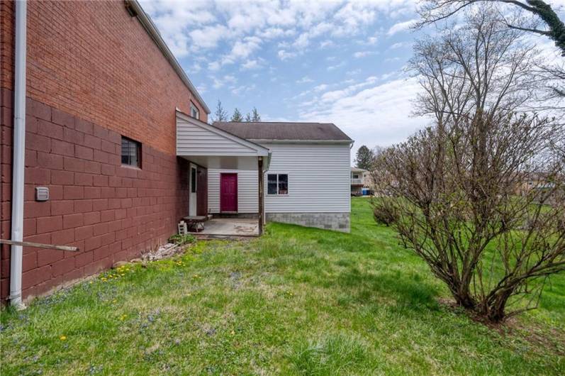 Patio off of game room leading to back yard.