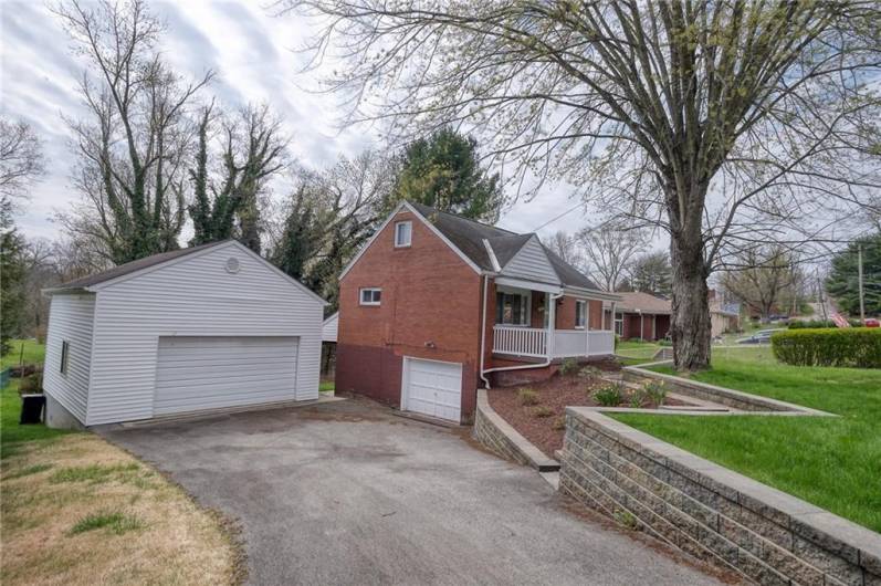 Home plus extra large garage.