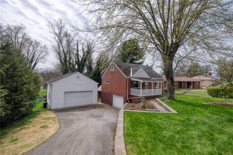 3 bedroom cape cod on 0.3 acre with extra large detached garage