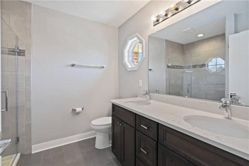 Master Bath with tiled walk-in shower.