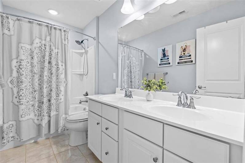 Hall bath with TWO sinks to ease the morning rush!