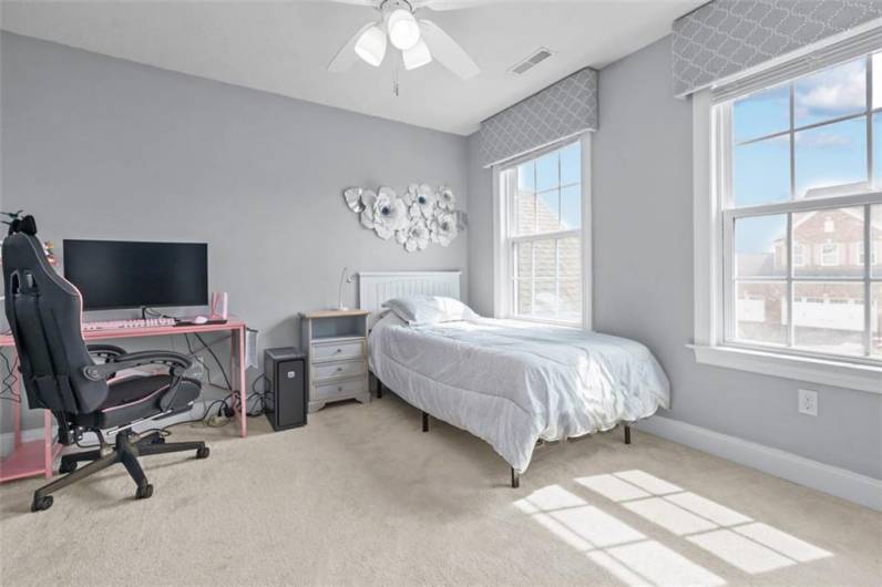 Bredroom 3 with lighted ceiling fan, spacious closet...