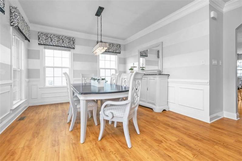 The dining room is off the entry (was optional office space)...