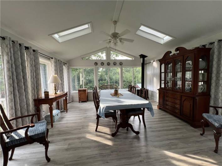 Four Season Room with Vaulted Ceiling and Skylights