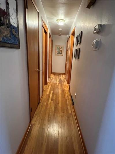 Hallway to bedrooms (all Hardwood floors have been refinished)