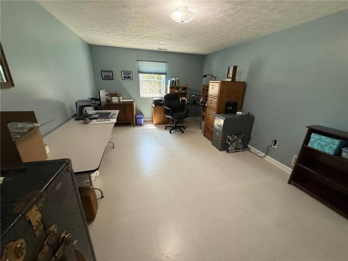 Bedroom or office as it is currently used. Very good closet space too.